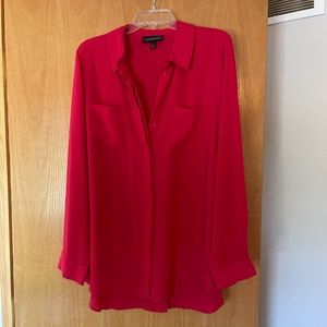 Fire engine red blouse.